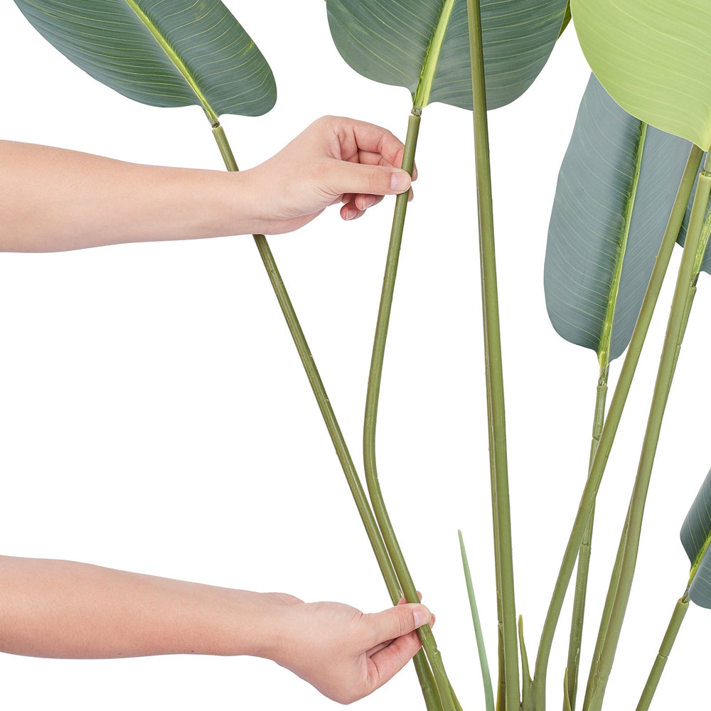 Artificial Birds Of Paradise Tree, 5 FT Tall Faux Plant, PE Material & Anti-Tip Tilt Protection Low-Maintenance Plant, Lifelike Green Fake Tree for Home Office Warehouse Decor Indoor Outdoor Media 7